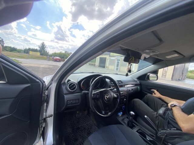 Серый Мазда 3, объемом двигателя 1.6 л и пробегом 350 тыс. км за 900 $, фото 2 на Automoto.ua