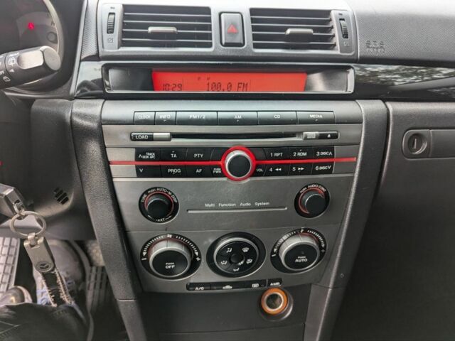 Серый Мазда 3, объемом двигателя 1.6 л и пробегом 217 тыс. км за 5499 $, фото 5 на Automoto.ua