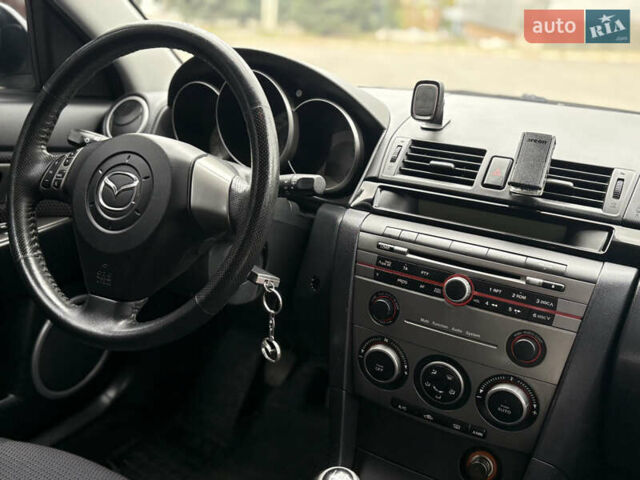 Сірий Мазда 3, об'ємом двигуна 1.6 л та пробігом 190 тис. км за 4999 $, фото 10 на Automoto.ua