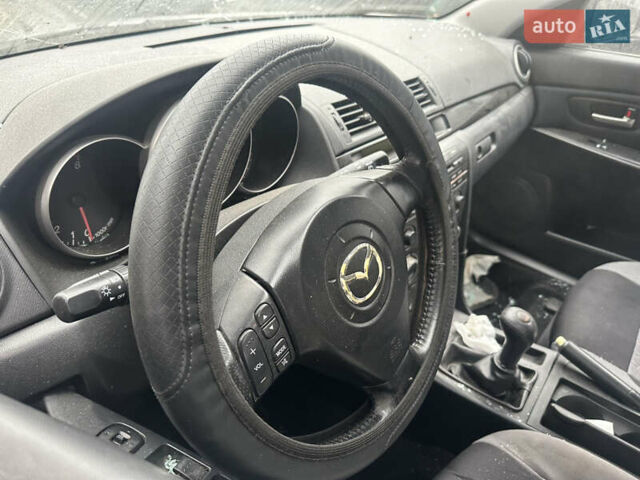 Серый Мазда 3, объемом двигателя 1.6 л и пробегом 200 тыс. км за 1750 $, фото 4 на Automoto.ua