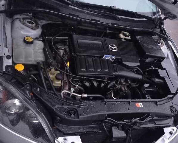 Серый Мазда 3, объемом двигателя 1.6 л и пробегом 140 тыс. км за 3900 $, фото 4 на Automoto.ua