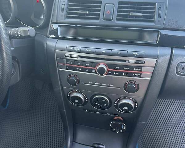 Серый Мазда 3, объемом двигателя 1.6 л и пробегом 275 тыс. км за 5200 $, фото 3 на Automoto.ua