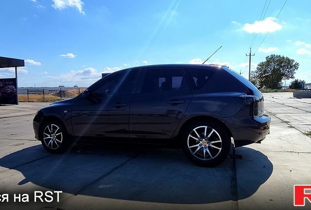 Серый Мазда 3, объемом двигателя 1.6 л и пробегом 282 тыс. км за 6000 $, фото 4 на Automoto.ua