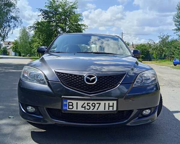 Сірий Мазда 3, об'ємом двигуна 1.56 л та пробігом 247 тис. км за 6700 $, фото 12 на Automoto.ua