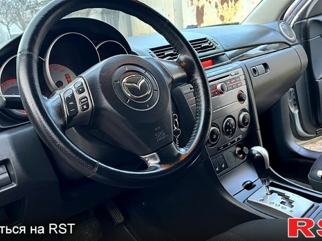 Серый Мазда 3, объемом двигателя 1.6 л и пробегом 31000 тыс. км за 5400 $, фото 3 на Automoto.ua