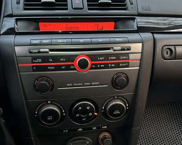 Сірий Мазда 3, об'ємом двигуна 1.6 л та пробігом 283 тис. км за 5500 $, фото 19 на Automoto.ua