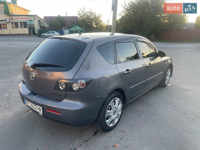 Серый Мазда 3, объемом двигателя 2 л и пробегом 300 тыс. км за 6500 $, фото 3 на Automoto.ua