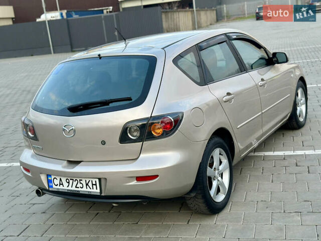 Серый Мазда 3, объемом двигателя 2 л и пробегом 220 тыс. км за 4300 $, фото 2 на Automoto.ua