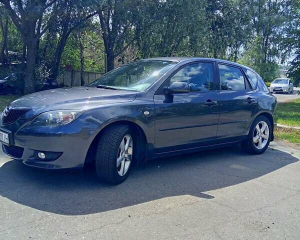 Сірий Мазда 3, об'ємом двигуна 1.56 л та пробігом 247 тис. км за 6700 $, фото 10 на Automoto.ua