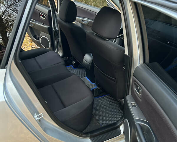 Сірий Мазда 3, об'ємом двигуна 1.6 л та пробігом 283 тис. км за 5500 $, фото 12 на Automoto.ua
