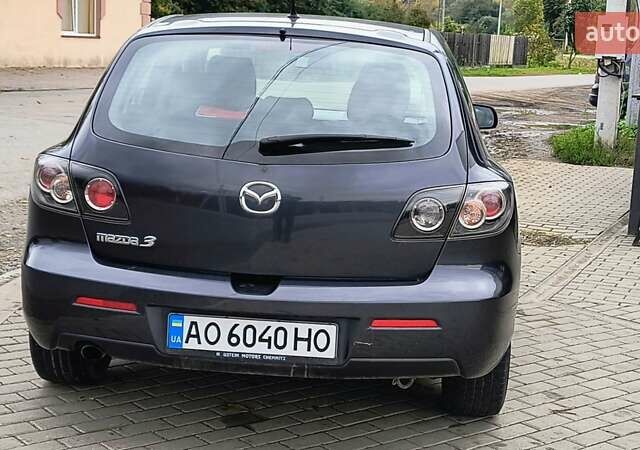 Серый Мазда 3, объемом двигателя 1.61 л и пробегом 174 тыс. км за 4300 $, фото 5 на Automoto.ua