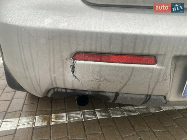 Серый Мазда 3, объемом двигателя 1.6 л и пробегом 196 тыс. км за 4500 $, фото 9 на Automoto.ua