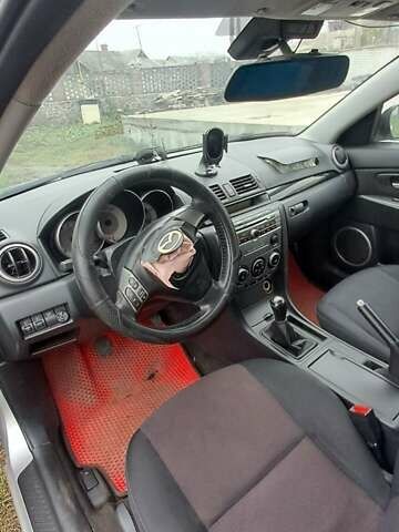 Серый Мазда 3, объемом двигателя 1.6 л и пробегом 370 тыс. км за 2200 $, фото 8 на Automoto.ua