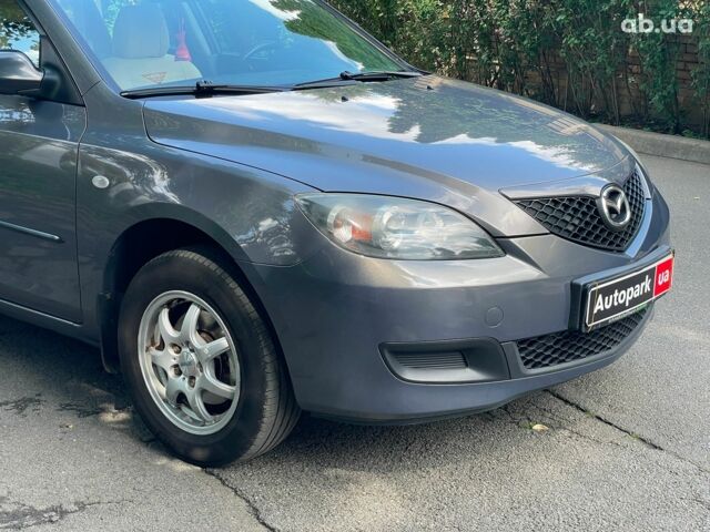 Сірий Мазда 3, об'ємом двигуна 1.4 л та пробігом 305 тис. км за 5340 $, фото 2 на Automoto.ua