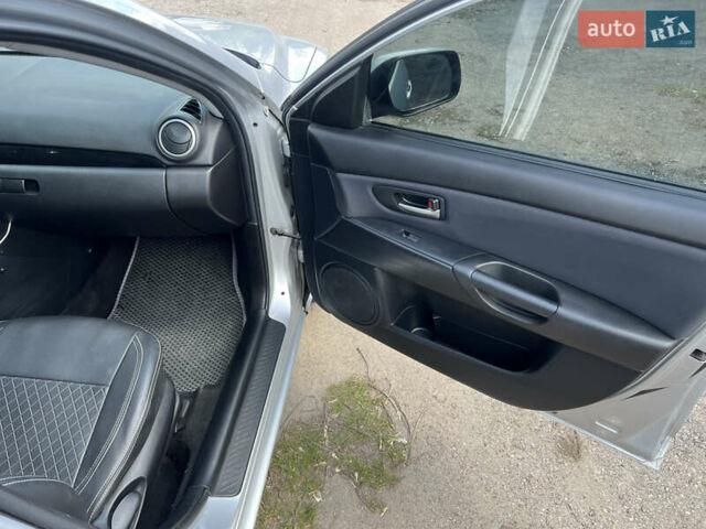 Сірий Мазда 3, об'ємом двигуна 1.6 л та пробігом 232 тис. км за 4200 $, фото 14 на Automoto.ua