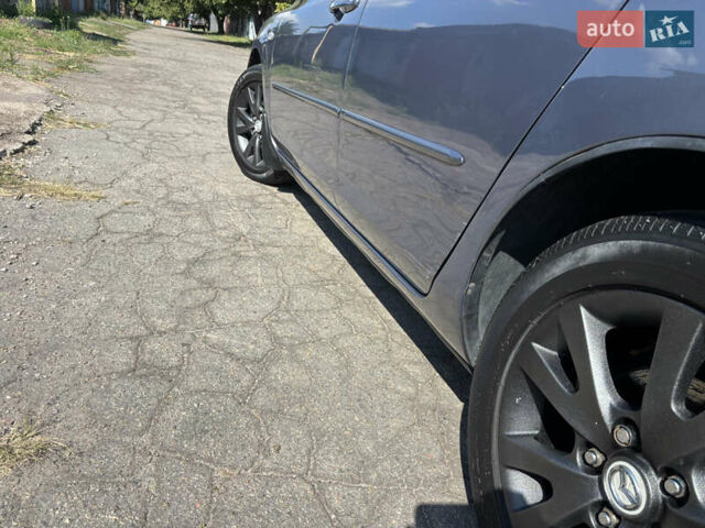 Сірий Мазда 3, об'ємом двигуна 1.6 л та пробігом 233 тис. км за 6000 $, фото 9 на Automoto.ua