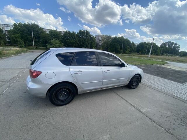 Серый Мазда 3, объемом двигателя 1.6 л и пробегом 350 тыс. км за 900 $, фото 1 на Automoto.ua