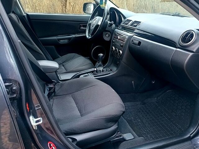 Серый Мазда 3, объемом двигателя 1.6 л и пробегом 228 тыс. км за 4550 $, фото 7 на Automoto.ua
