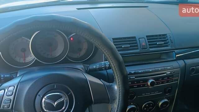 Серый Мазда 3, объемом двигателя 1.6 л и пробегом 230 тыс. км за 4150 $, фото 23 на Automoto.ua