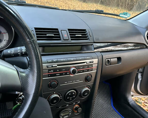 Сірий Мазда 3, об'ємом двигуна 1.6 л та пробігом 283 тис. км за 5500 $, фото 17 на Automoto.ua