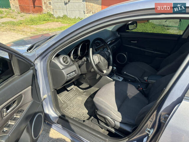 Сірий Мазда 3, об'ємом двигуна 1.6 л та пробігом 233 тис. км за 6000 $, фото 11 на Automoto.ua