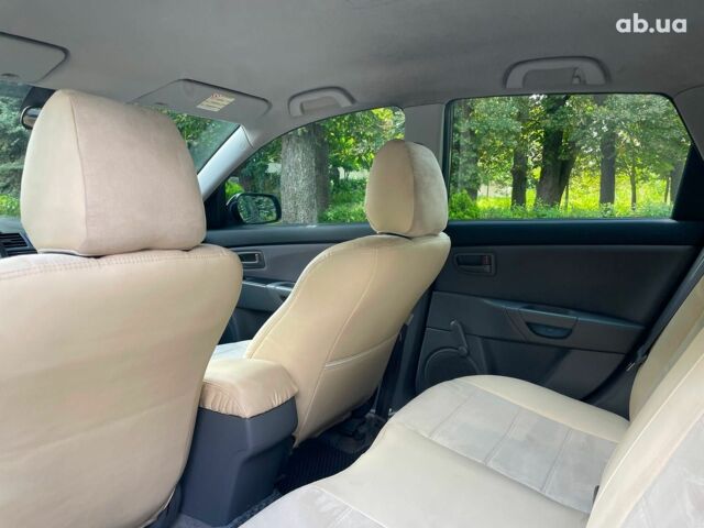 Сірий Мазда 3, об'ємом двигуна 1.4 л та пробігом 305 тис. км за 5340 $, фото 20 на Automoto.ua