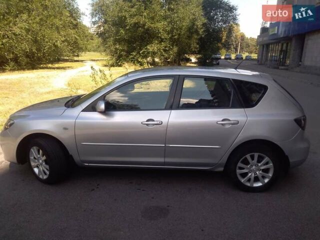 Серый Мазда 3, объемом двигателя 1.56 л и пробегом 174 тыс. км за 6000 $, фото 11 на Automoto.ua