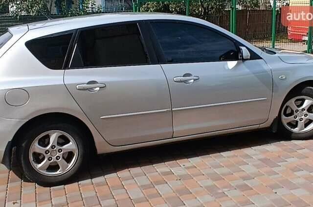 Серый Мазда 3, объемом двигателя 1.6 л и пробегом 230 тыс. км за 4150 $, фото 1 на Automoto.ua