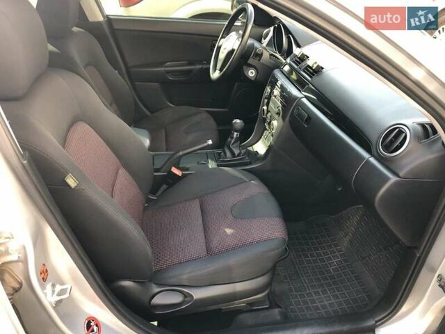 Серый Мазда 3, объемом двигателя 1.6 л и пробегом 147 тыс. км за 4400 $, фото 4 на Automoto.ua