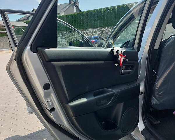 Серый Мазда 3, объемом двигателя 1.6 л и пробегом 211 тыс. км за 4750 $, фото 13 на Automoto.ua