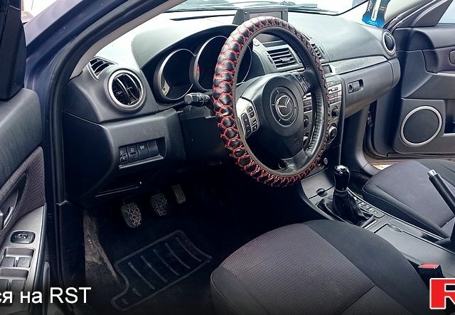 Мазда 3 2006 в Ямполь на Automoto.ua Серый Мазда 3, объемом двигателя 2 л и пробегом 300 тыс. км за 5000 $, фото 5 на Automoto.ua