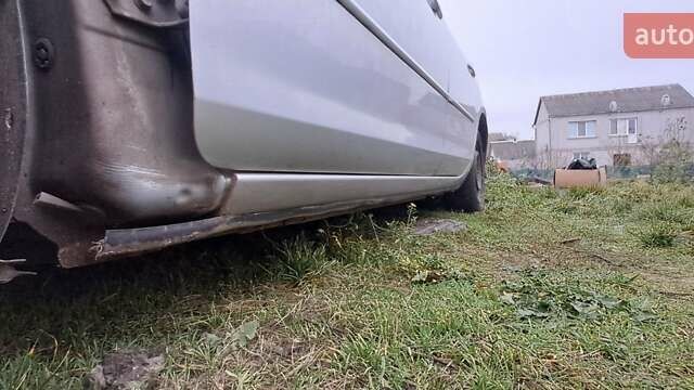 Серый Мазда 3, объемом двигателя 1.6 л и пробегом 370 тыс. км за 2200 $, фото 7 на Automoto.ua