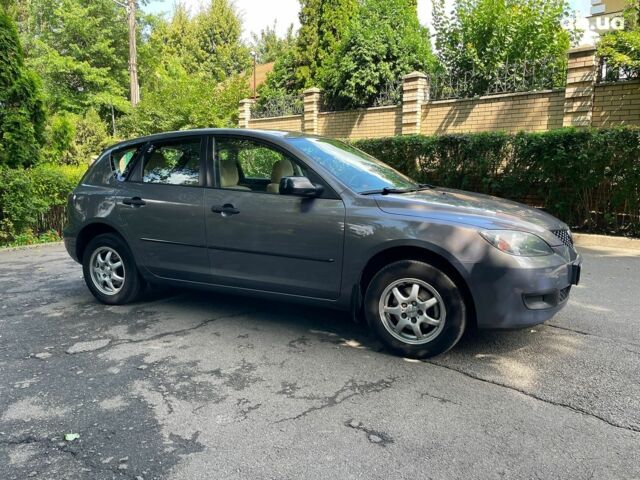 Сірий Мазда 3, об'ємом двигуна 1.4 л та пробігом 305 тис. км за 5340 $, фото 3 на Automoto.ua