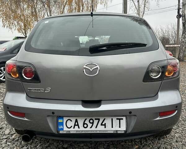 Сірий Мазда 3, об'ємом двигуна 1.6 л та пробігом 216 тис. км за 4800 $, фото 6 на Automoto.ua