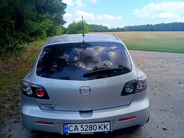 Серый Мазда 3, объемом двигателя 1.6 л и пробегом 254 тыс. км за 4800 $, фото 1 на Automoto.ua