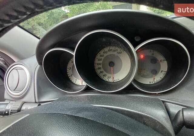 Серый Мазда 3, объемом двигателя 1.56 л и пробегом 380 тыс. км за 3600 $, фото 1 на Automoto.ua