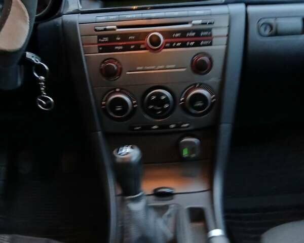 Серый Мазда 3, объемом двигателя 1.6 л и пробегом 255 тыс. км за 4800 $, фото 1 на Automoto.ua