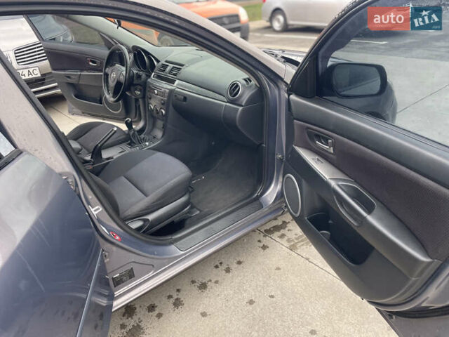 Серый Мазда 3, объемом двигателя 2 л и пробегом 299 тыс. км за 4300 $, фото 17 на Automoto.ua
