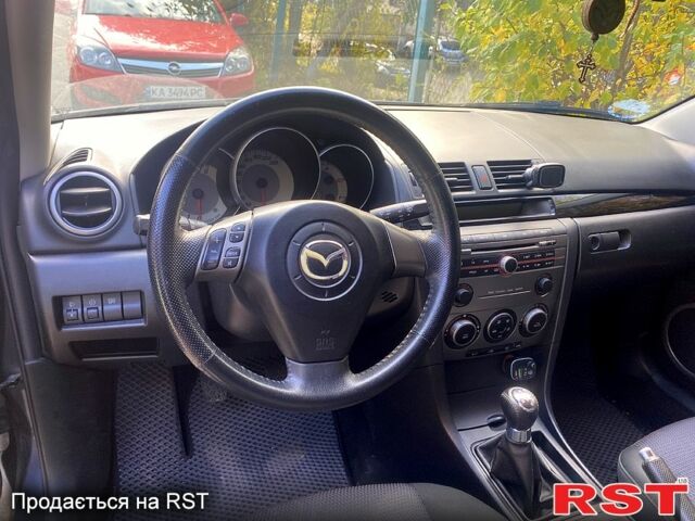 Серый Мазда 3, объемом двигателя 1.6 л и пробегом 196 тыс. км за 5700 $, фото 9 на Automoto.ua