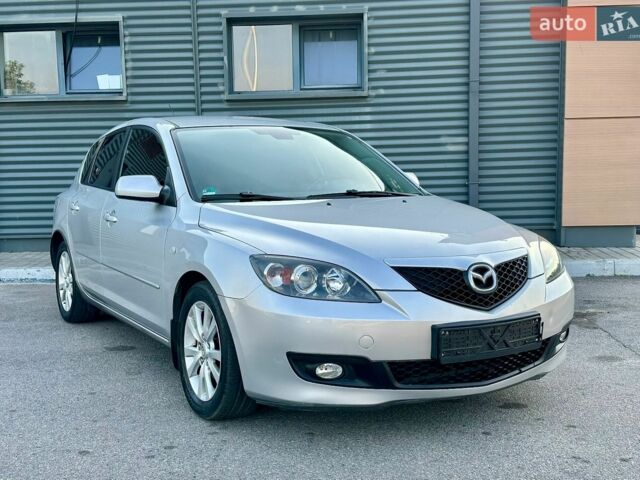 Серый Мазда 3, объемом двигателя 1.6 л и пробегом 285 тыс. км за 4999 $, фото 1 на Automoto.ua