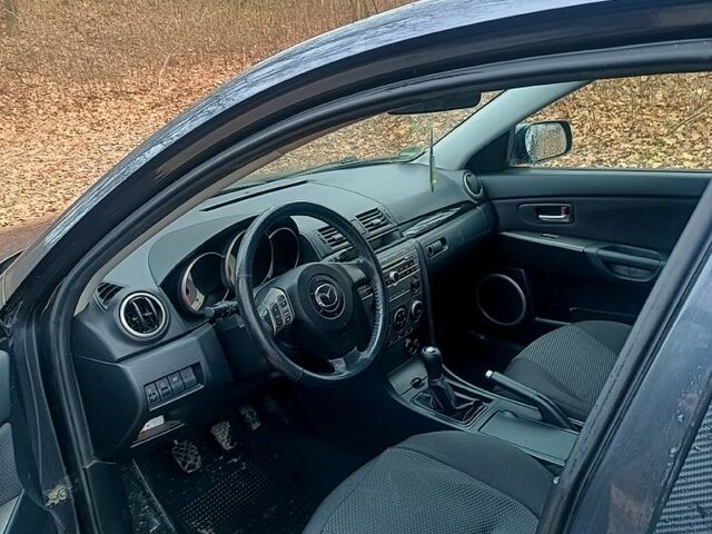 Серый Мазда 3, объемом двигателя 1.6 л и пробегом 228 тыс. км за 4550 $, фото 6 на Automoto.ua
