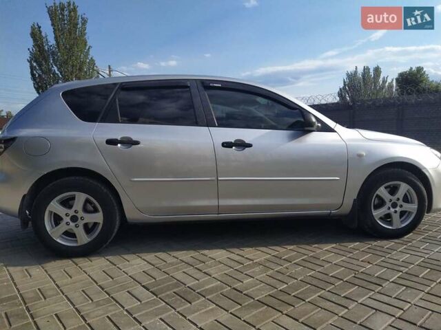 Серый Мазда 3, объемом двигателя 1.6 л и пробегом 290 тыс. км за 5200 $, фото 4 на Automoto.ua