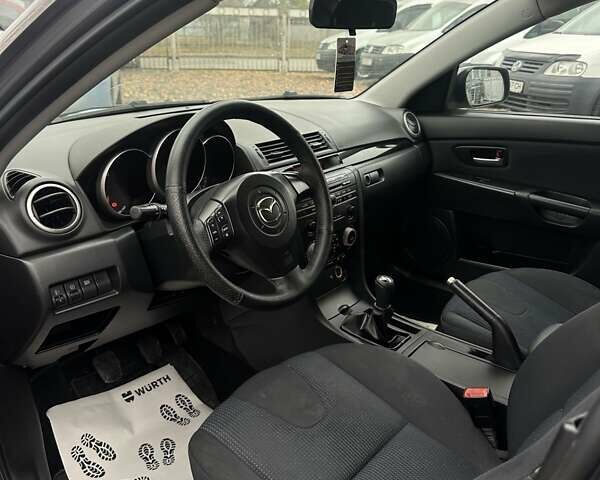 Сірий Мазда 3, об'ємом двигуна 1.6 л та пробігом 216 тис. км за 4800 $, фото 12 на Automoto.ua