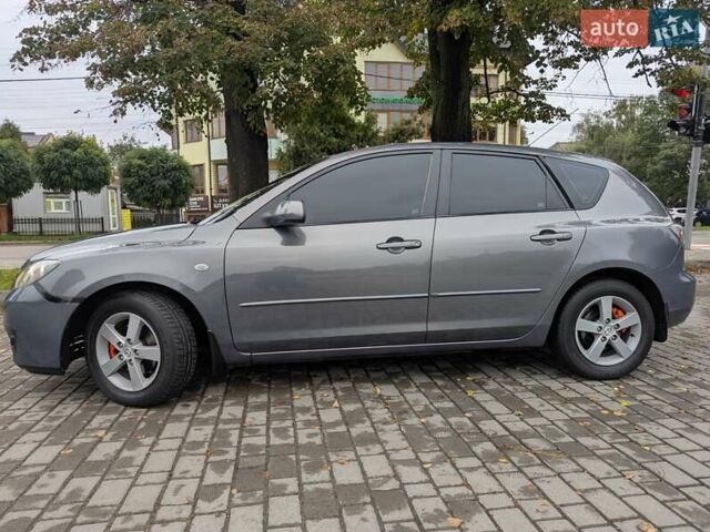 Серый Мазда 3, объемом двигателя 1.6 л и пробегом 217 тыс. км за 5499 $, фото 8 на Automoto.ua