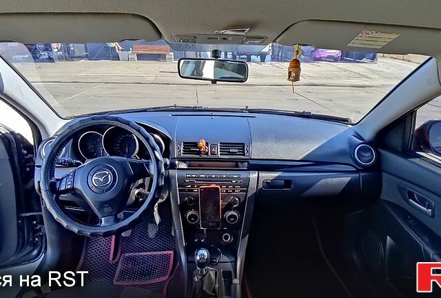 Серый Мазда 3, объемом двигателя 1.6 л и пробегом 282 тыс. км за 6000 $, фото 6 на Automoto.ua