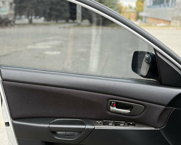 Сірий Мазда 3, об'ємом двигуна 1.6 л та пробігом 190 тис. км за 4999 $, фото 12 на Automoto.ua