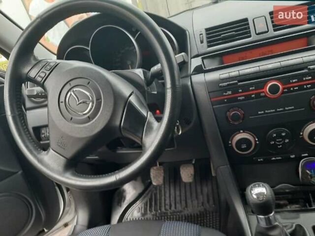 Сірий Мазда 3, об'ємом двигуна 1.56 л та пробігом 188 тис. км за 5620 $, фото 3 на Automoto.ua