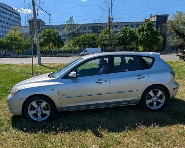 Серый Мазда 3, объемом двигателя 2.3 л и пробегом 202 тыс. км за 4499 $, фото 2 на Automoto.ua