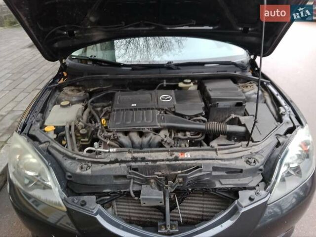 Серый Мазда 3, объемом двигателя 1.6 л и пробегом 242 тыс. км за 4500 $, фото 8 на Automoto.ua