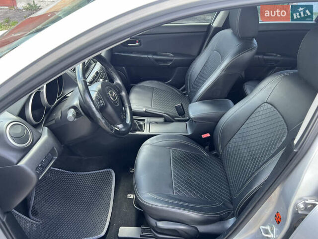 Сірий Мазда 3, об'ємом двигуна 1.6 л та пробігом 232 тис. км за 4200 $, фото 12 на Automoto.ua